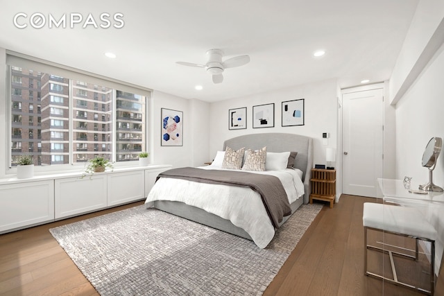 420 E 58th St Unit 14B, New York City, NY 10022 - bedroom with wood-type flooring, recessed lighting, and a ceiling fan