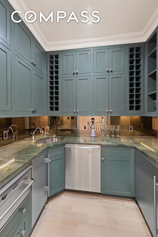 9 W 84th St, New York City, NY 10024 - kitchen featuring stainless steel dishwasher, a warming drawer, a sink, crown molding, and open shelves