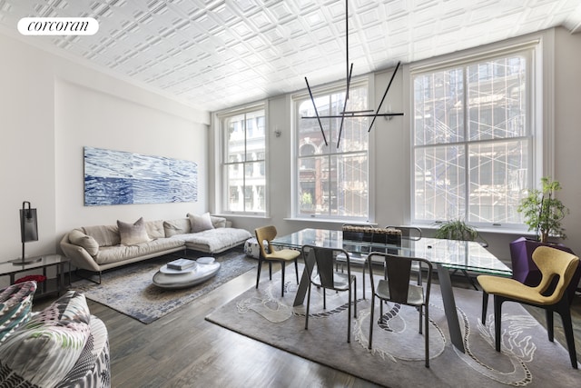 46 Lispenard St Unit 4E, New York City, NY 10013 - dining room featuring wood finished floors and an ornate ceiling