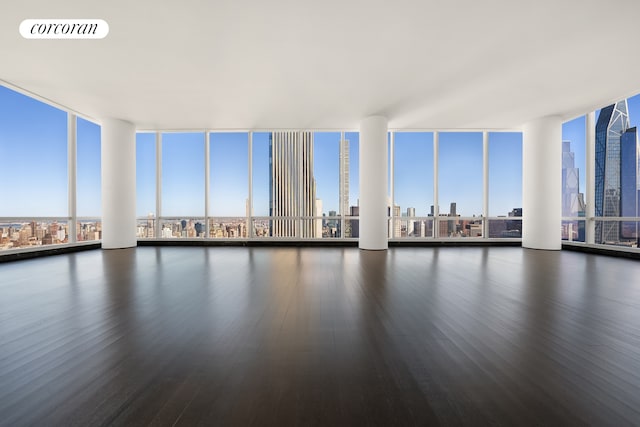 157 W 57th St Unit 56C, New York City, NY 10019 - interior space featuring a city view and visible vents