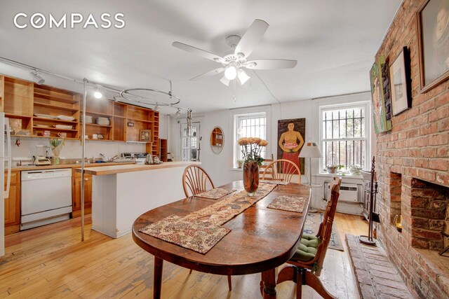 337 E 18th St, New York City, NY 10003 - dining room featuring light wood-style floors, ceiling fan, and an AC wall unit