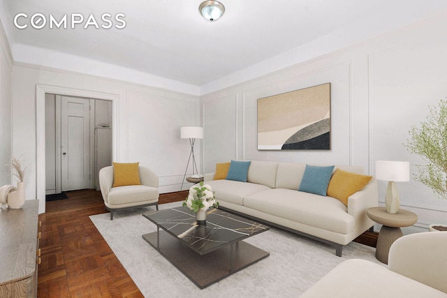 living room featuring a decorative wall