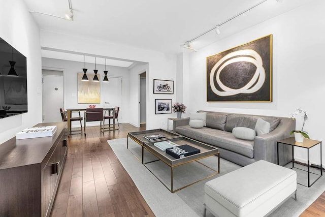 20 E 68th St Unit 5G, New York City, NY 10065 - living room with rail lighting and wood-type flooring