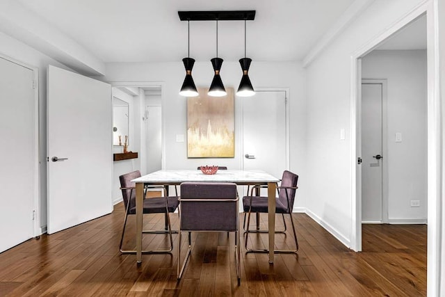 20 E 68th St Unit 5G, New York City, NY 10065 - dining room with dark wood-type flooring and baseboards