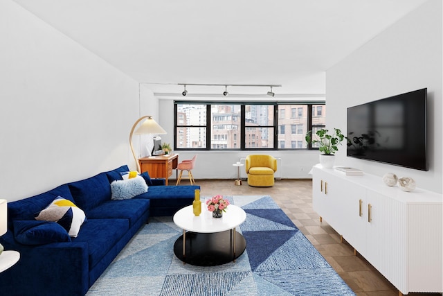 225 E 36th St Unit 11R, New York City, NY 10016 - living room featuring rail lighting