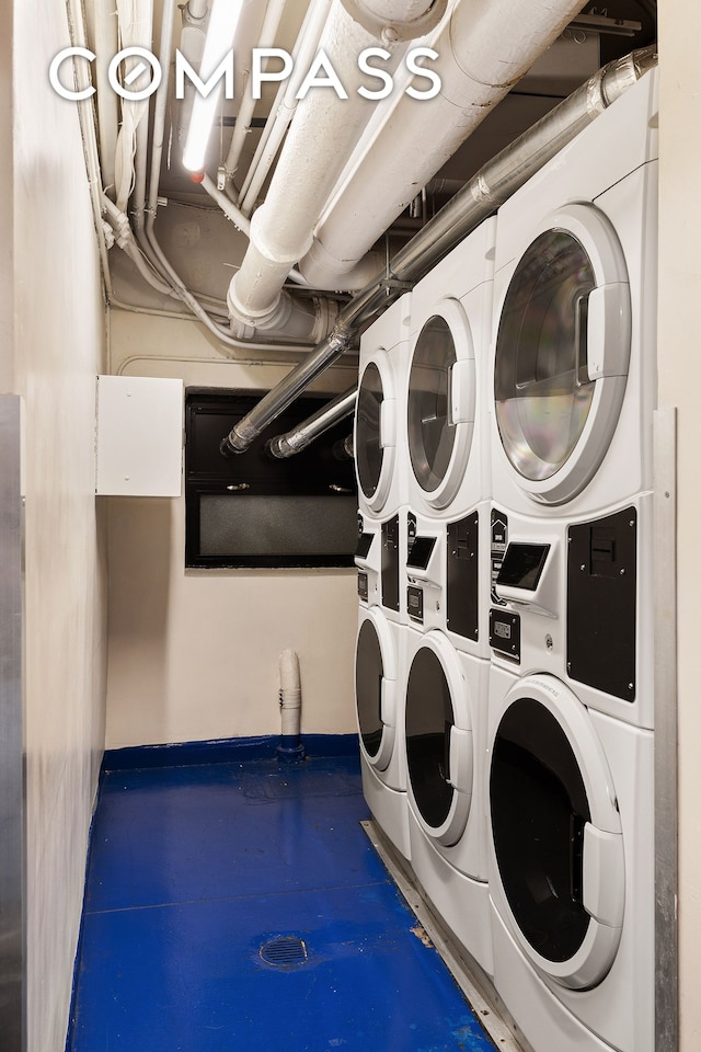 community laundry featuring stacked washer / dryer and washer and dryer