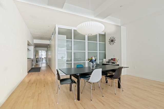 dining room with light wood-style floors