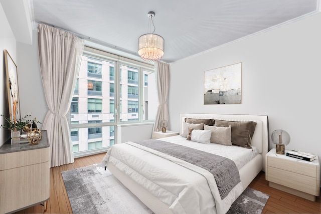 80 Riverside Blvd Unit 5-S, New York City, NY 10069 - bedroom with light wood-style floors and ornamental molding