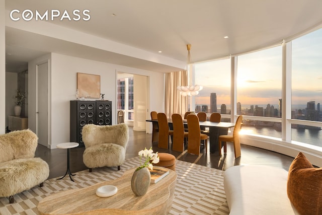 interior space featuring a city view and wood finished floors