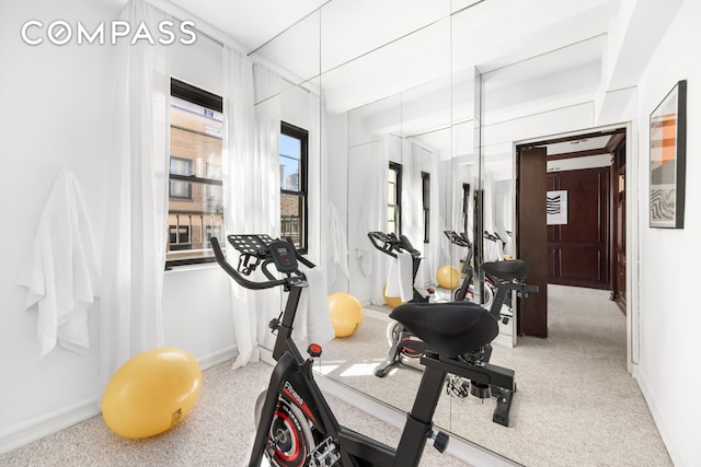 1049 Park Ave Ph, Ph, New York City, NY 10028 - workout area with baseboards and carpet