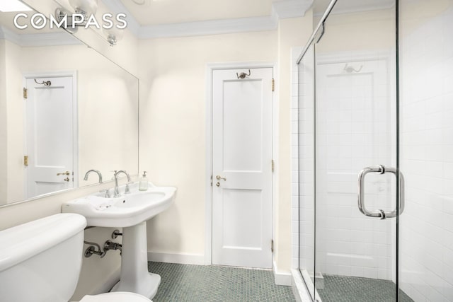 1049 Park Ave Ph, Ph, New York City, NY 10028 - bathroom featuring toilet, a shower stall, tile patterned flooring, crown molding, and baseboards