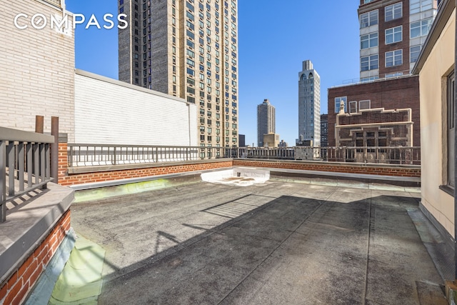 1049 Park Ave Ph, Ph, New York City, NY 10028 - view of patio featuring a skyline view