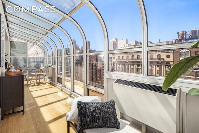 1049 Park Ave Ph, Ph, New York City, NY 10028 - sunroom featuring a view of skyline and plenty of natural light