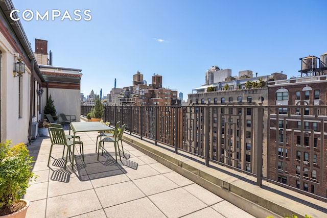 1049 Park Ave Ph, Ph, New York City, NY 10028 - view of patio with outdoor dining space and a view of city