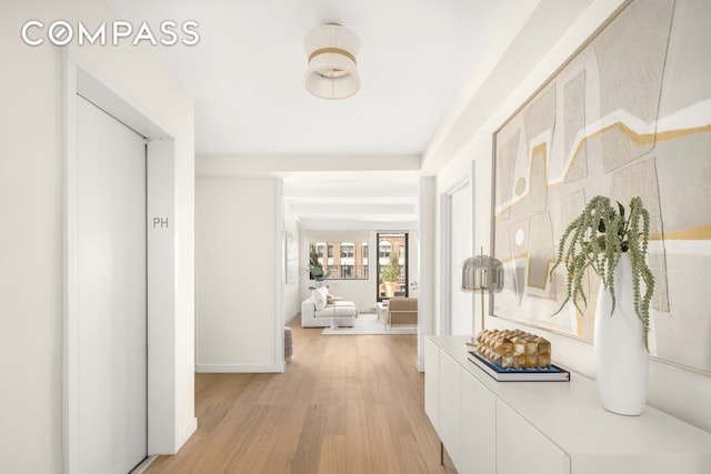 1049 Park Ave Ph, Ph, New York City, NY 10028 - corridor with light wood-style floors and baseboards