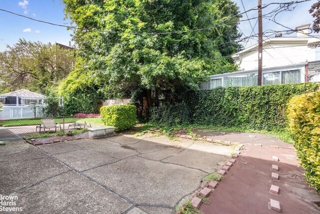 12 Girard St, New York City, NY 11235 - view of patio / terrace with fence