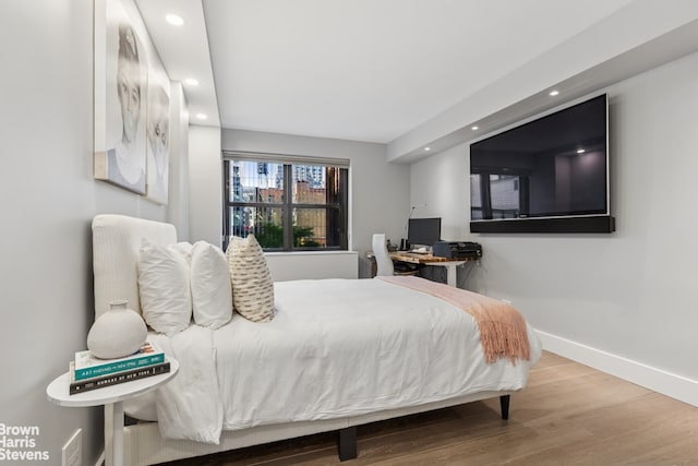115 E 9th St Unit 8Lm, New York City, NY 10003 - bedroom with recessed lighting and wood finished floors