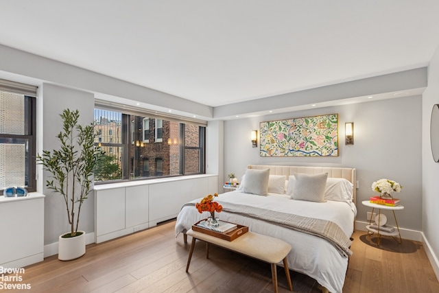 115 E 9th St Unit 8Lm, New York City, NY 10003 - bedroom featuring hardwood / wood-style floors and recessed lighting