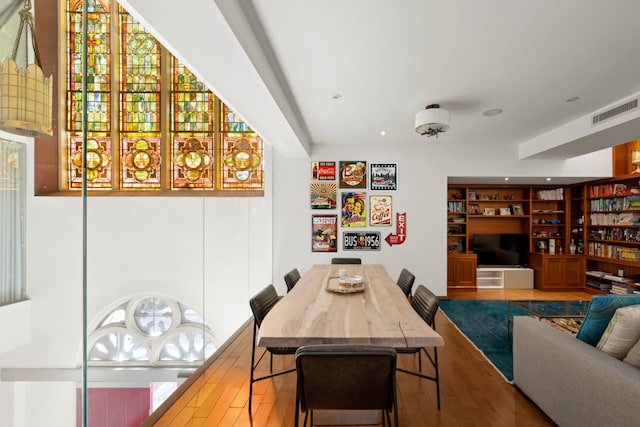135 W 4th St Unit 3W, New York City, NY 10012 - dining space with wood finished floors, recessed lighting, and built in features