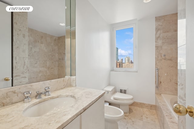 100 United Nations Plz Unit 35E, New York City, NY 10017 - bathroom with a bidet, toilet, vanity, and a view of city