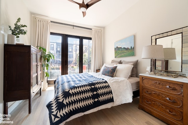 bedroom with wood finished floors and ceiling fan