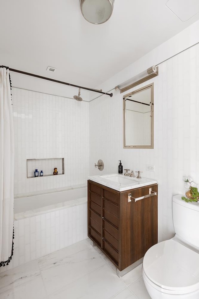 bathroom with toilet, vanity, and shower / tub combo with curtain