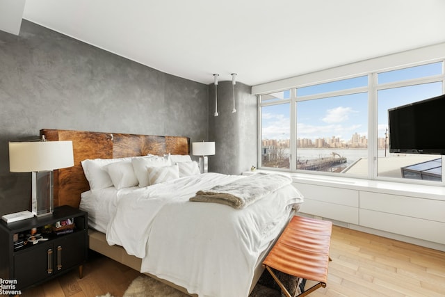 bedroom featuring light wood-type flooring