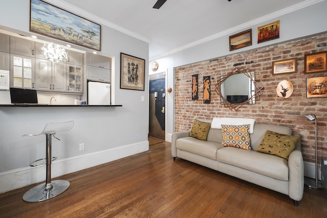 834 Riverside Dr Unit 2-E, New York City, NY 10032 - living room featuring wood finished floors, ornamental molding, baseboards, and a chandelier