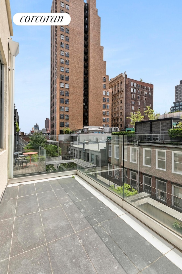 45 Lispenard St Unit 8E, New York City, NY 10013 - view of patio with a view of city and a balcony