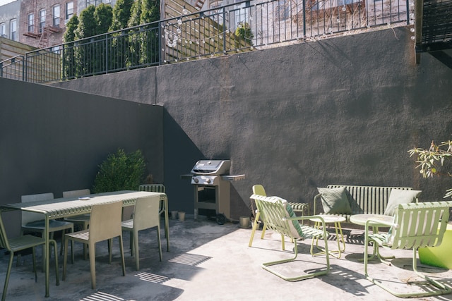 307 Cooper St Unit 1B, New York City, NY 11237 - view of patio / terrace featuring outdoor dining area and area for grilling
