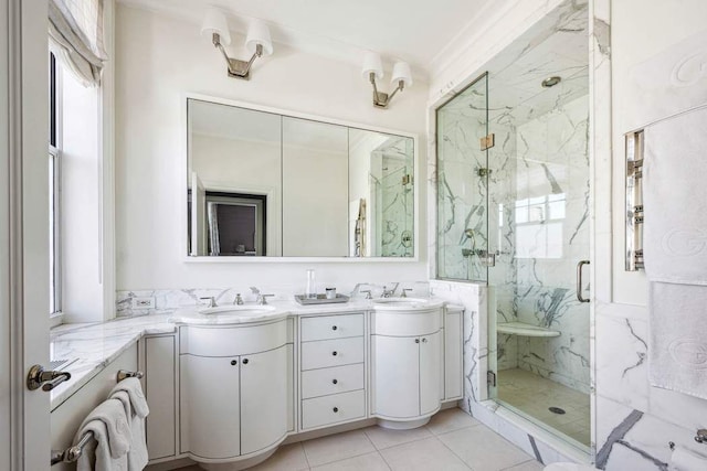 375 W End Ave Unit 9Ab, New York City, NY 10024 - full bathroom featuring a marble finish shower, double vanity, and tile patterned flooring