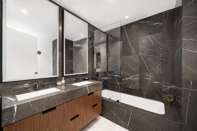 269 4th Ave Unit 403, New York City, NY 11215 - full bathroom featuring double vanity and tiled shower / bath combo