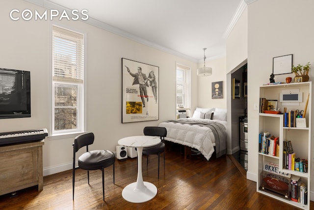 bedroom featuring dark wood-style floors, baseboards, and ornamental molding