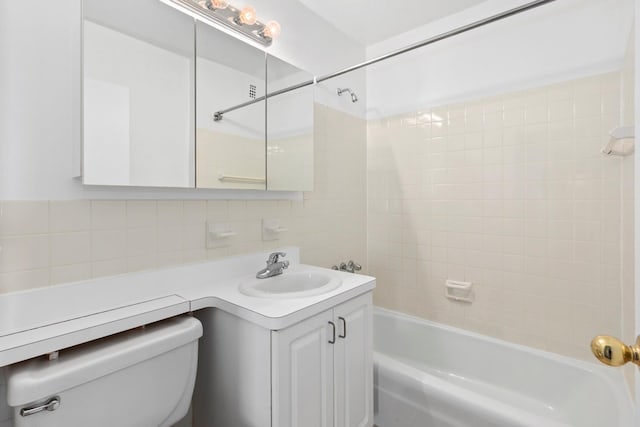 1619 3rd Ave Unit 21F, New York City, NY 10128 - bathroom with toilet, backsplash, shower / bathtub combination, and vanity