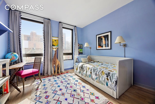 90 Furman St Unit N510, New York City, NY 11201 - bedroom featuring wood finished floors and baseboards