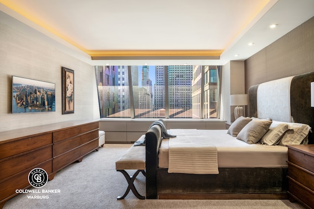 bedroom featuring light carpet