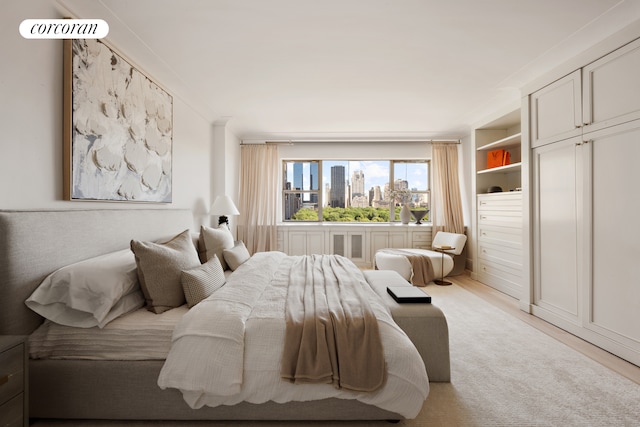 bedroom featuring wood finished floors
