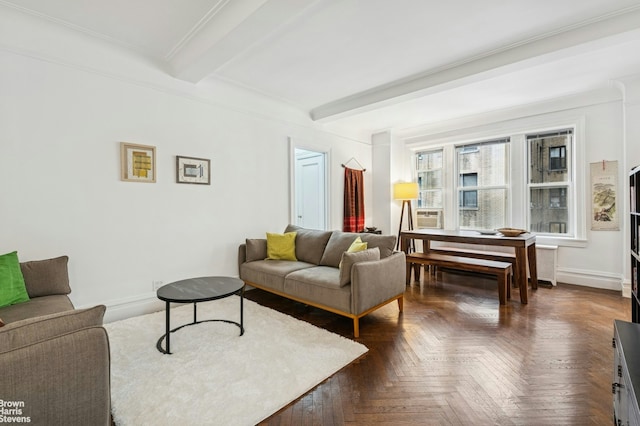 living room with beam ceiling and baseboards