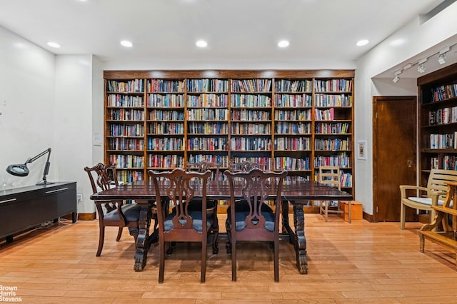 250 W 94th St Unit 3K, New York City, NY 10025 - living area with bookshelves, light wood-style floors, built in features, and recessed lighting
