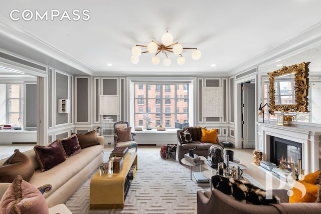 135 E 79th St Unit 8E, New York City, NY 10075 - living room featuring a decorative wall, healthy amount of natural light, crown molding, and a warm lit fireplace