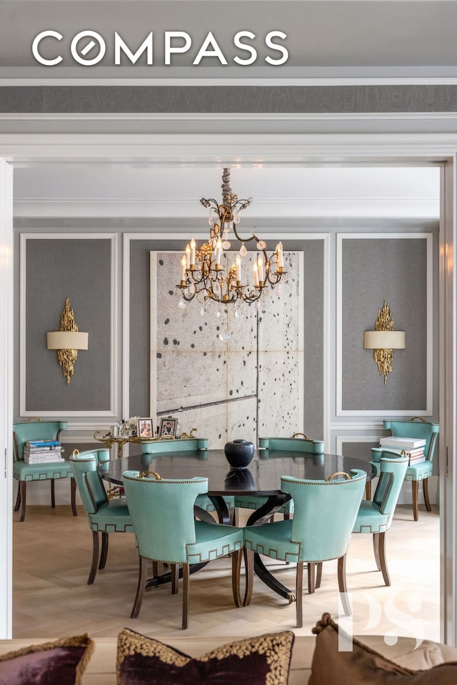 135 E 79th St Unit 8E, New York City, NY 10075 - dining space with a chandelier, wood finished floors, and a decorative wall