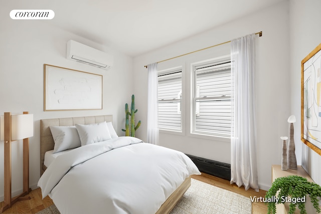 bedroom featuring an AC wall unit