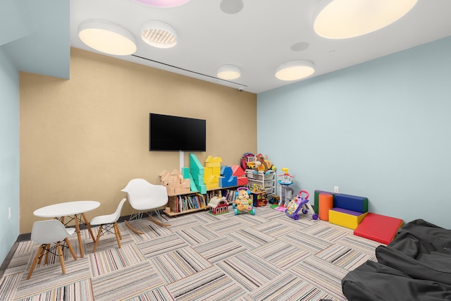 playroom featuring carpet flooring