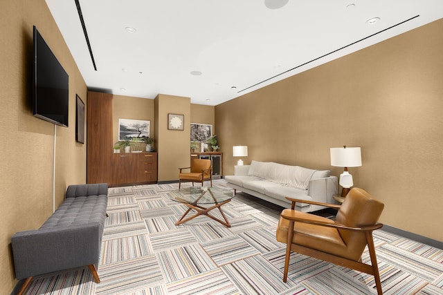 carpeted living room with recessed lighting