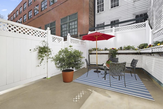 400 E 77th St Unit 1-H, New York City, NY 10075 - fenced backyard with a patio area and outdoor dining area