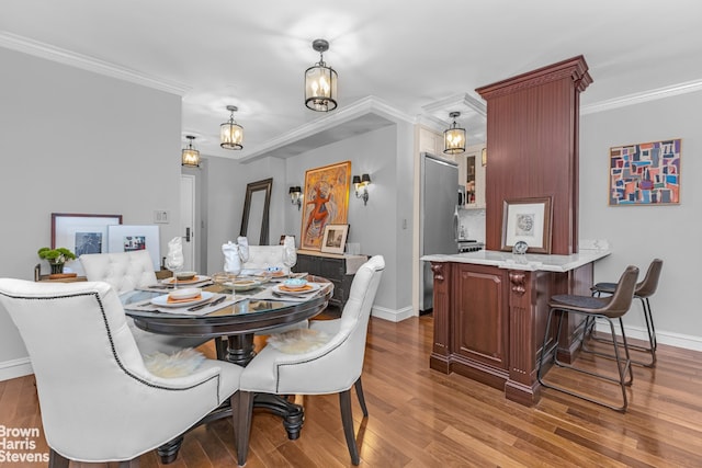 30 E 62nd St Unit 2H, New York City, NY 10065 - dining room with wood finished floors, baseboards, and crown molding
