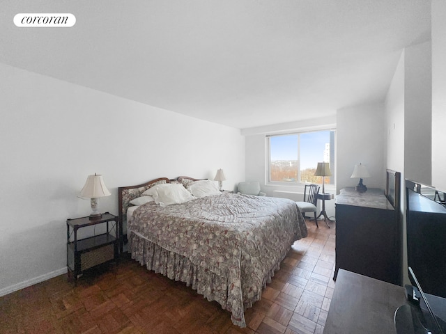 3333 Henry Hudson Pkwy Unit 8L, New York City, NY 10463 - bedroom featuring baseboards