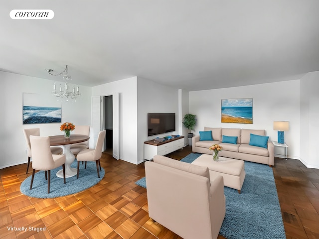3333 Henry Hudson Pkwy Unit 8L, New York City, NY 10463 - living room featuring a chandelier and baseboards