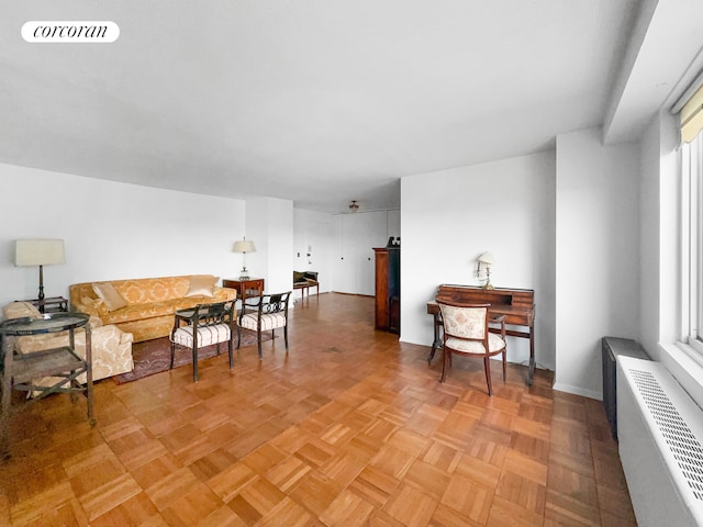3333 Henry Hudson Pkwy Unit 8L, New York City, NY 10463 - sitting room featuring radiator and baseboards