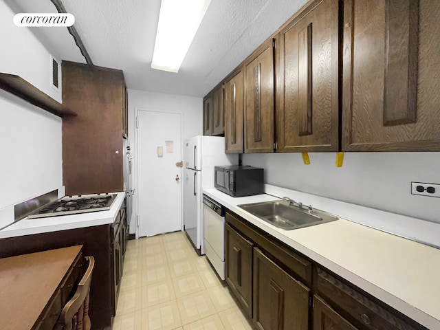 3333 Henry Hudson Pkwy Unit 8L, New York City, NY 10463 - kitchen featuring black microwave, white dishwasher, gas cooktop, light countertops, and light flooring